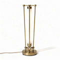 Brass table lamp with modern geometric design and integrated LED illumination